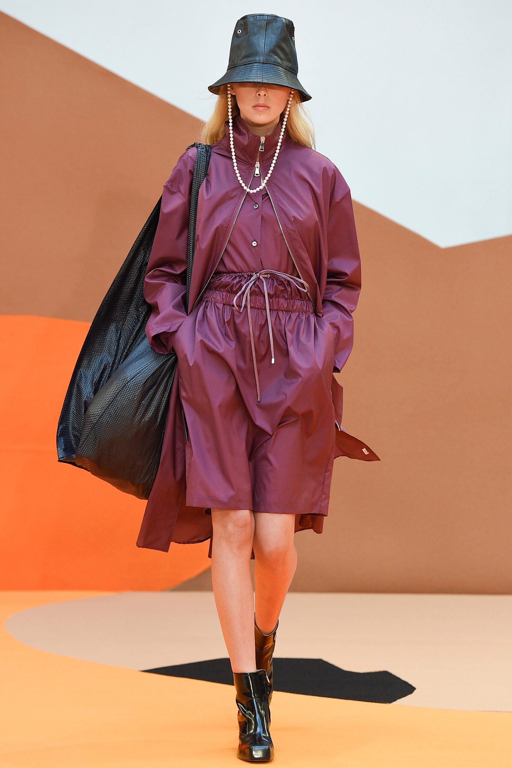 purple relaxed coat and fitted dress