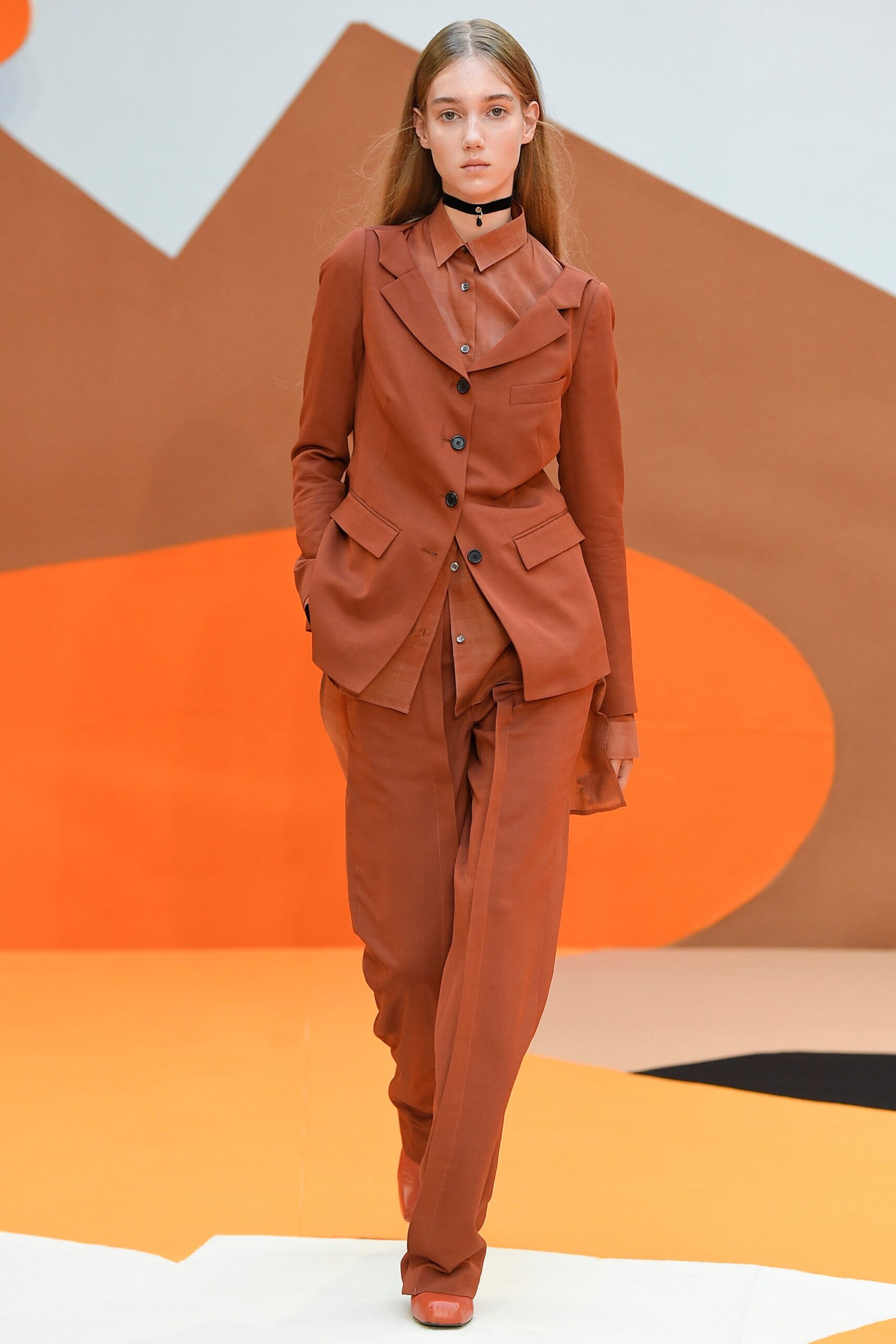 brown tailored suit
