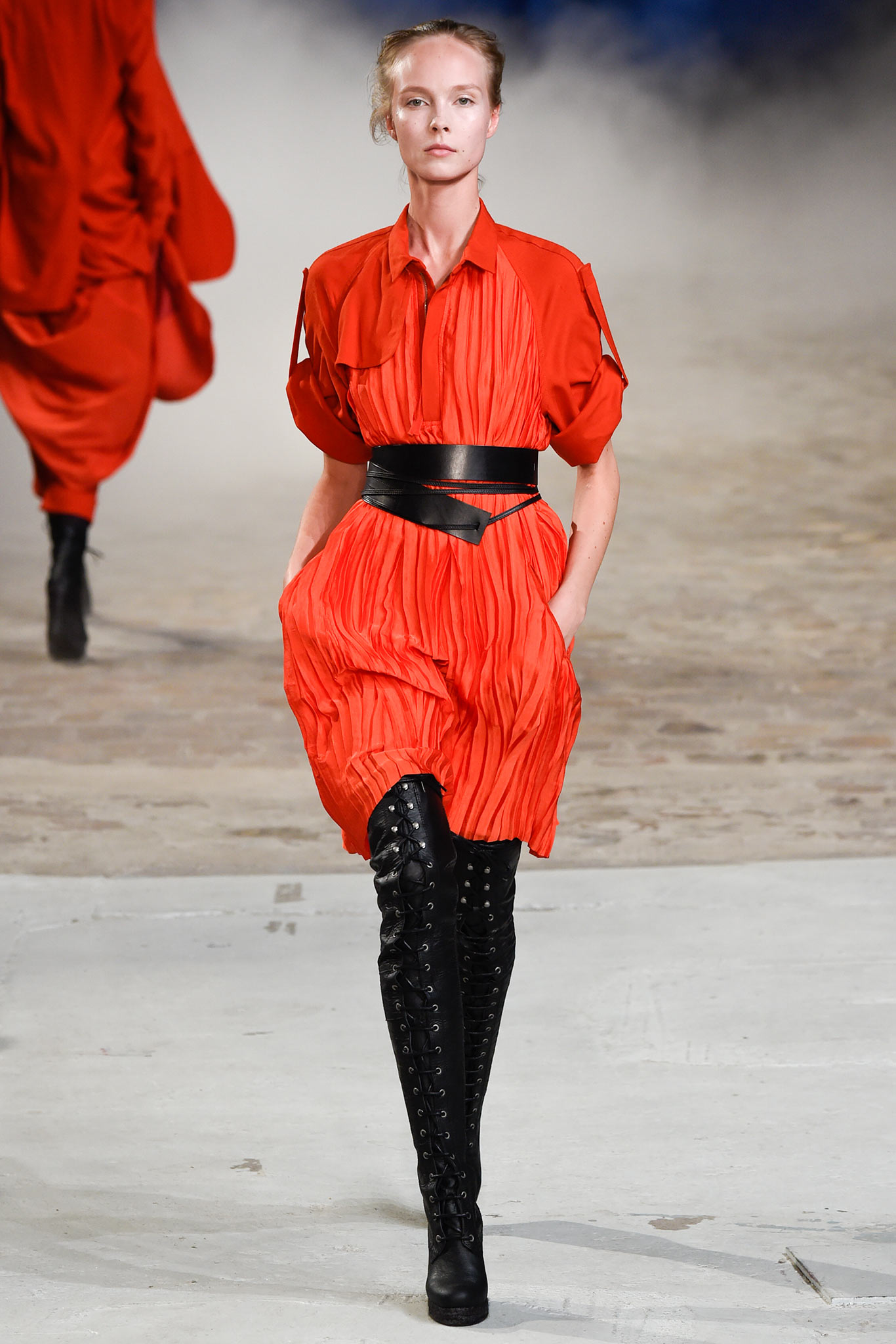 red pleated mini dress with black belt