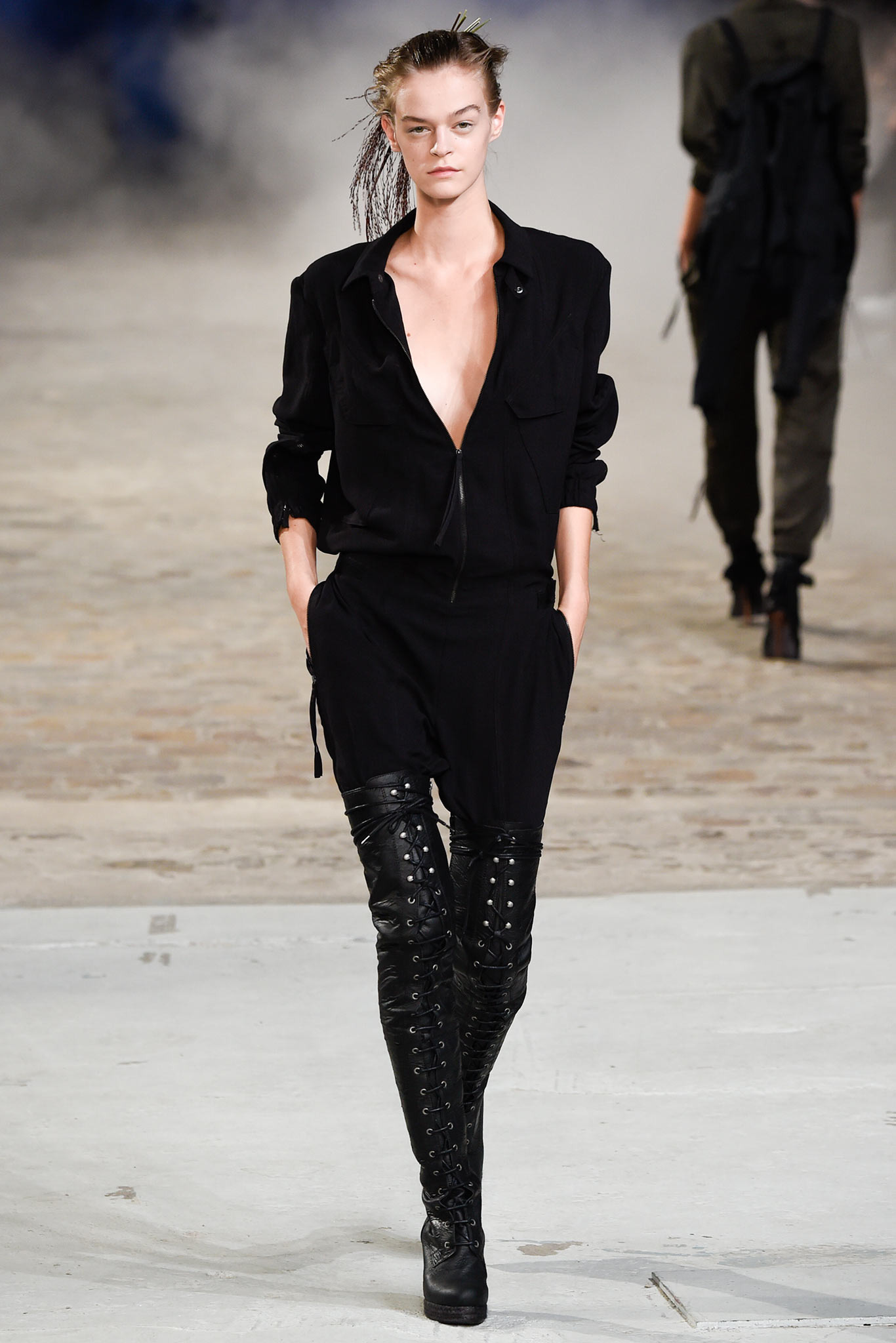 black fitted jumpsuit with laced boots