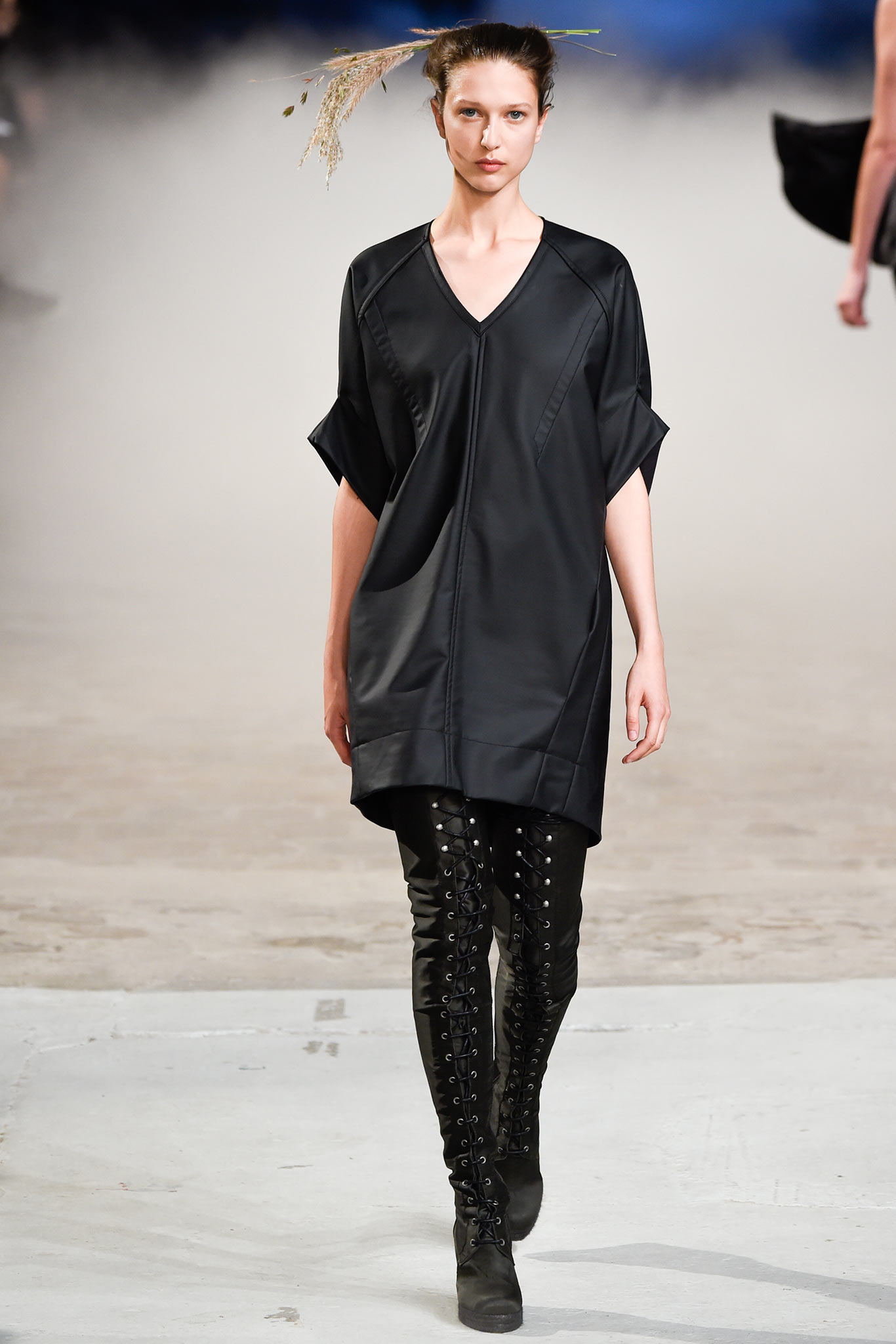 black relaxed dress with fitted boots