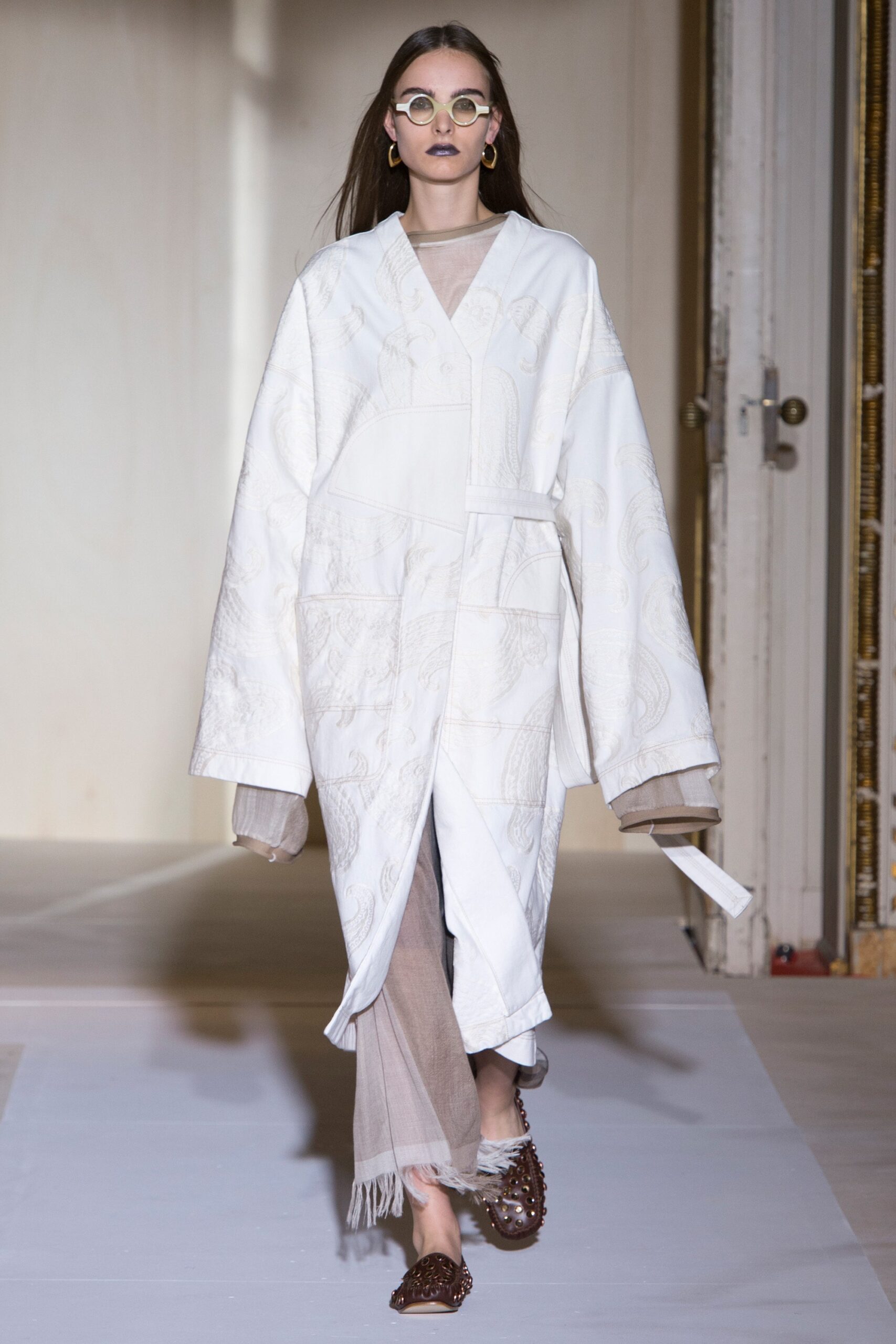 white oversized coat with beige dress