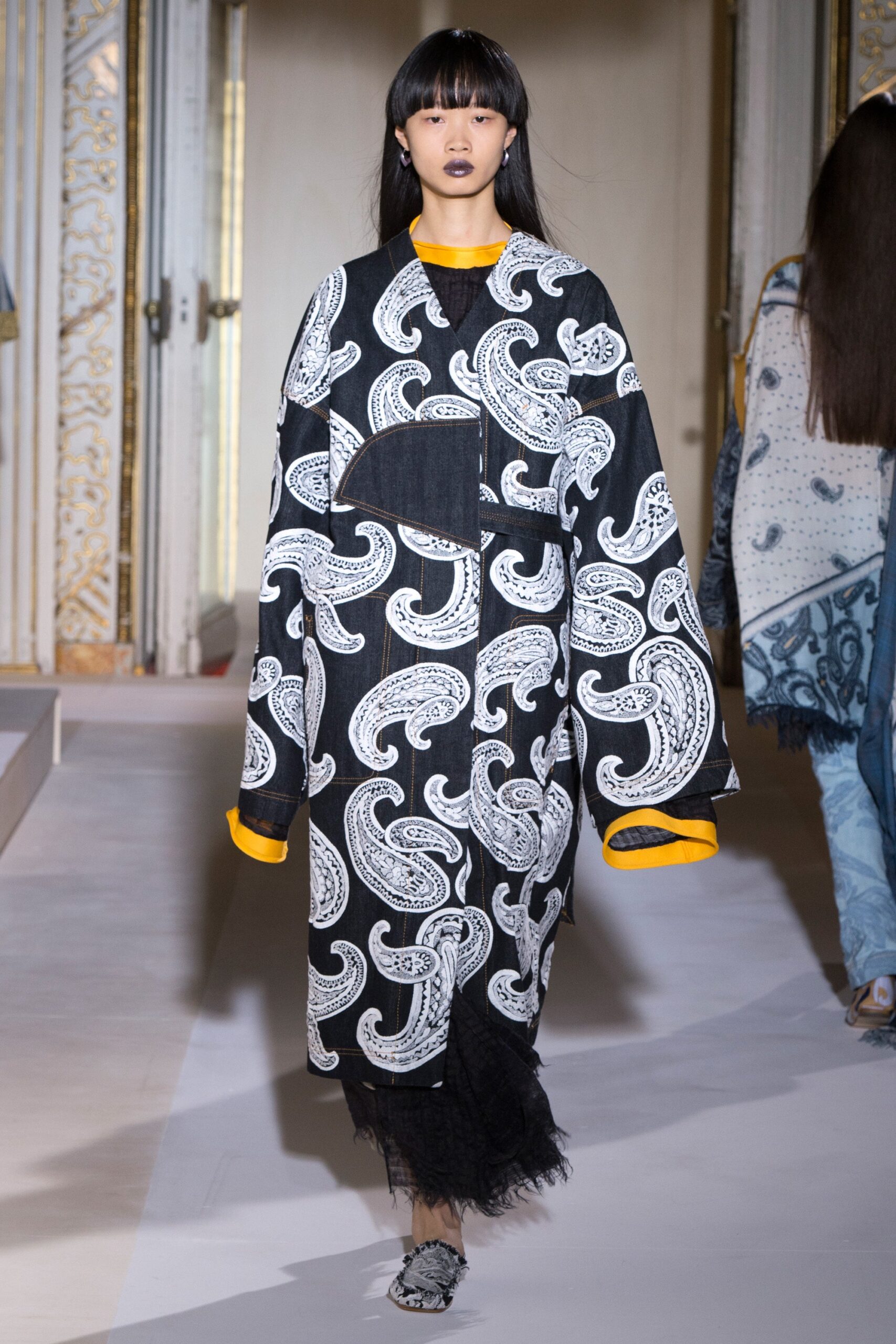 oversized black and white coat with yellow top