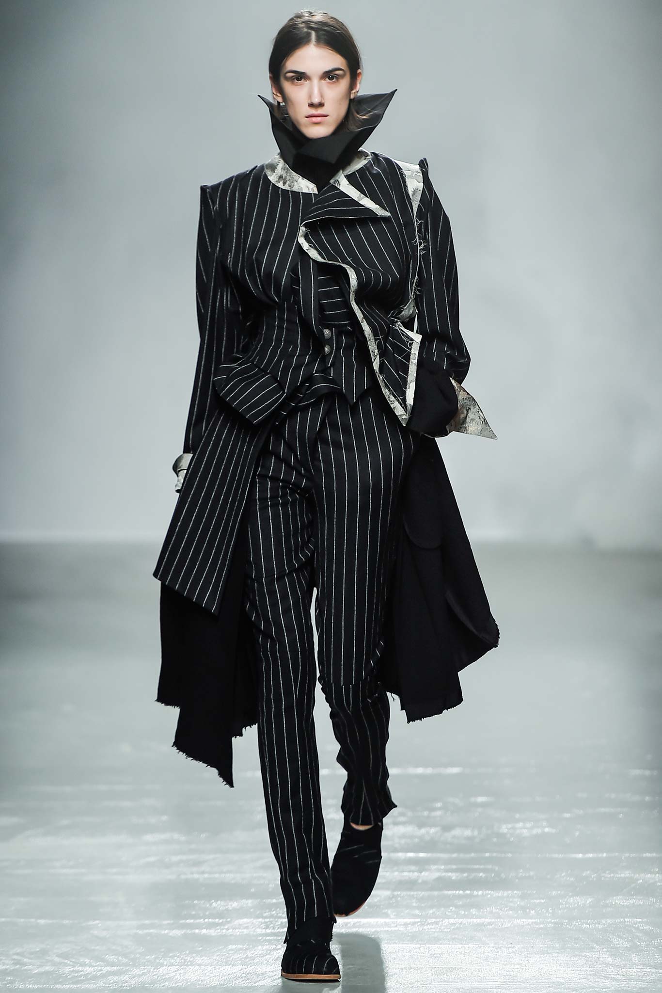 black cotton long-sleeve collared structured buttoned layered blazer