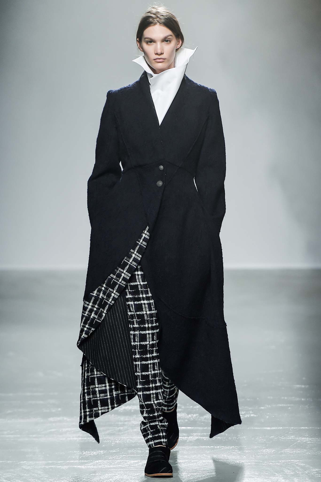 black wool long-sleeve collared structured layered maxi coat