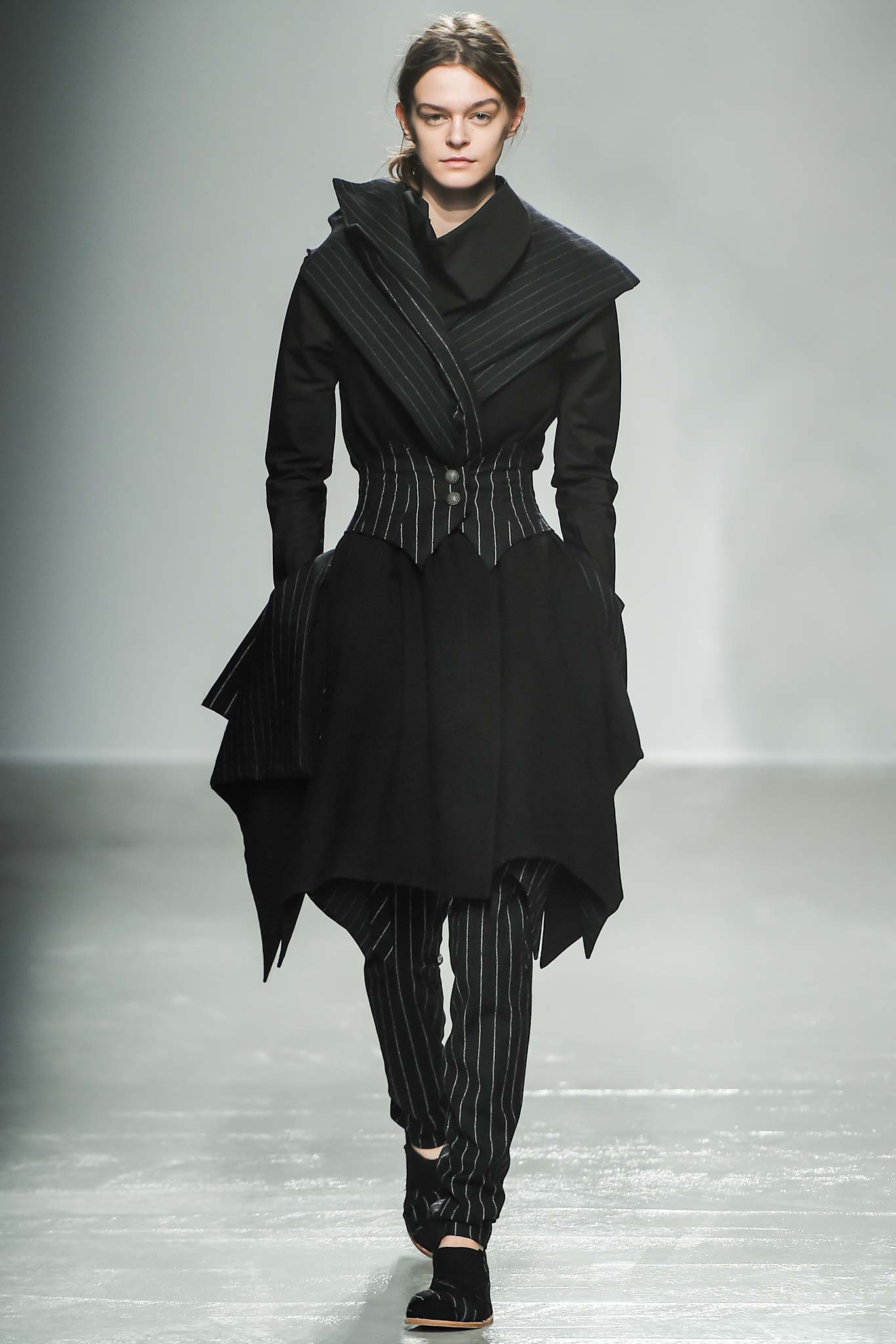 black fitted coat with striped pants
