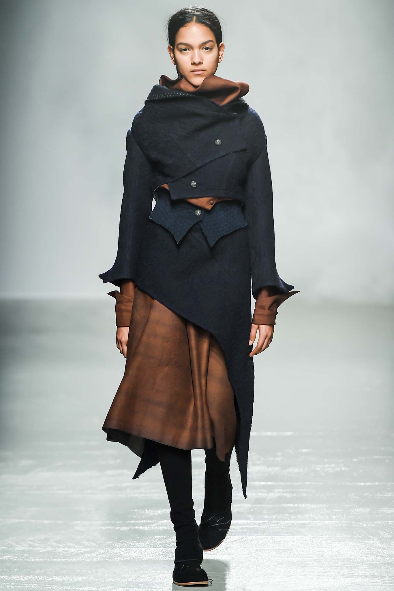 black wool asymmetric coat and brown silk dress