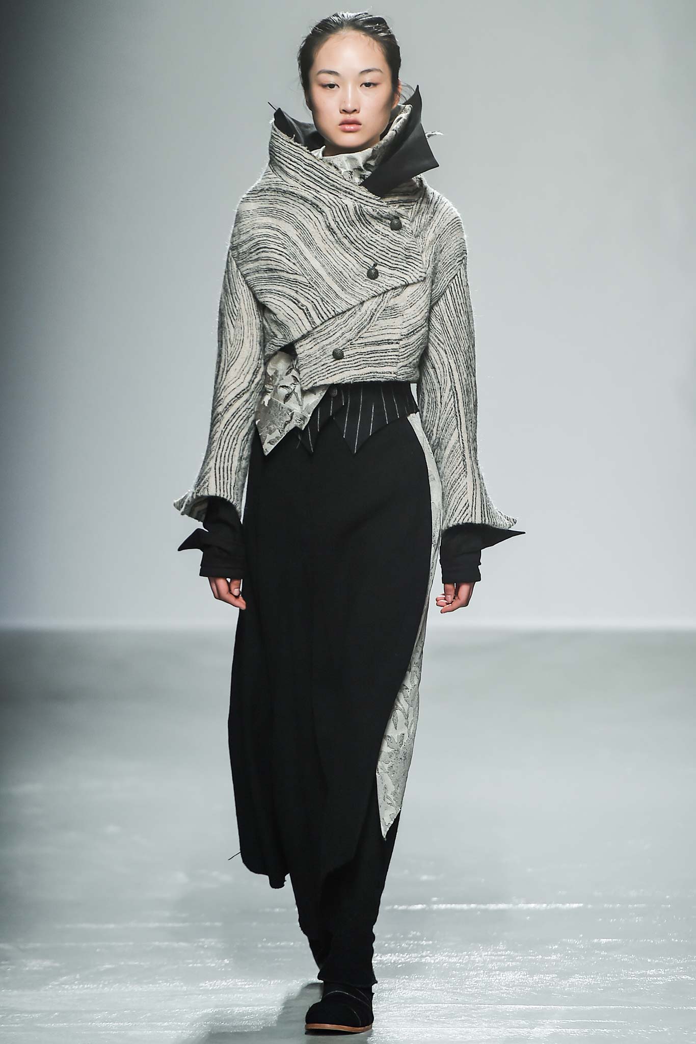 asymmetric black wool coat and skirt
