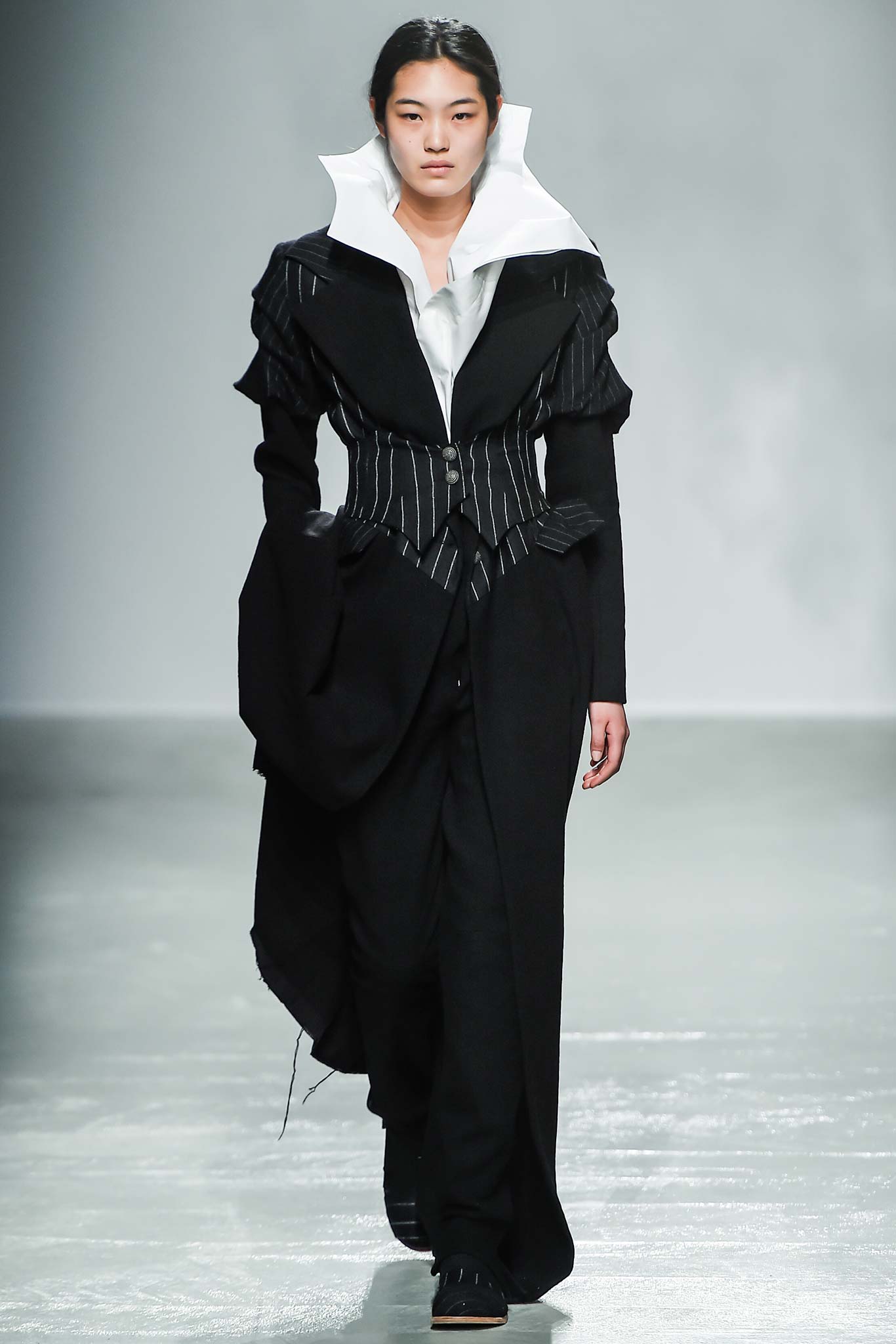 black wool long-sleeve collared fitted layered zippered coat