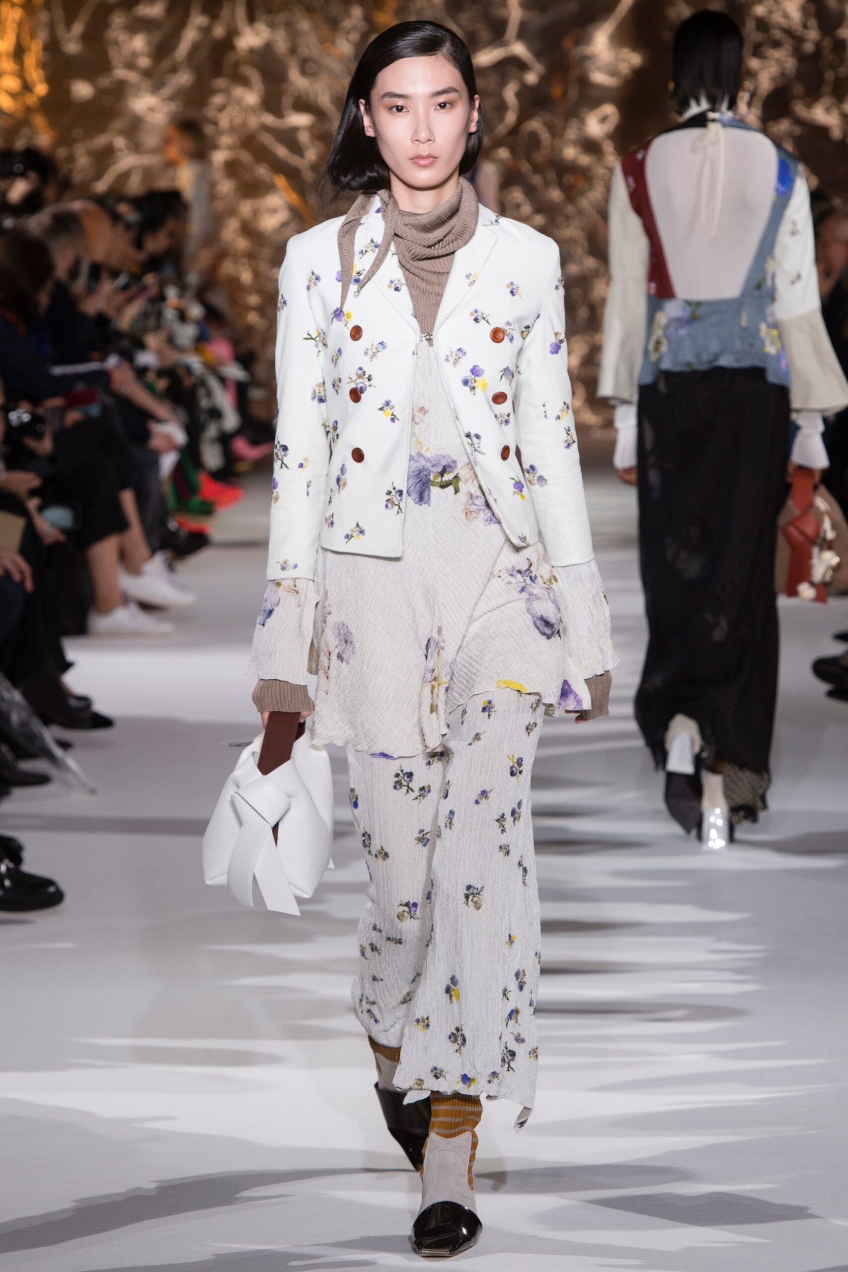 white embroidered jacket and dress