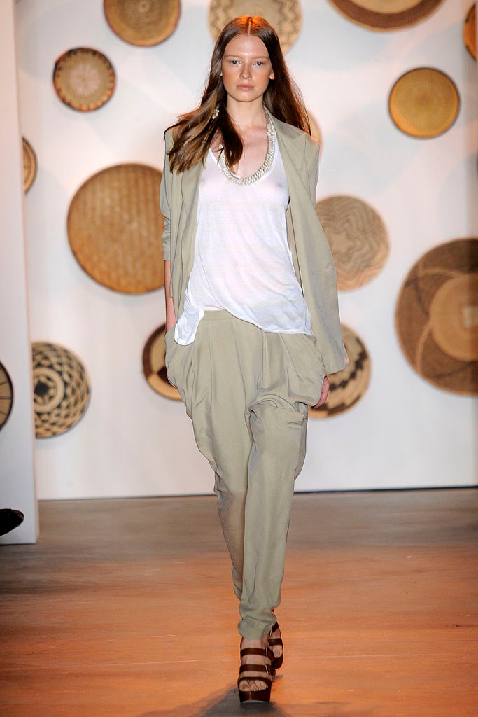 relaxed white top with beige pants