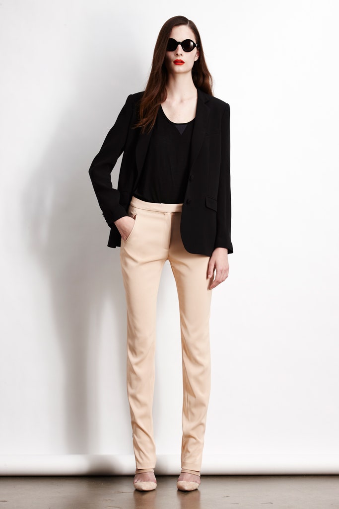 black blazer with beige pants