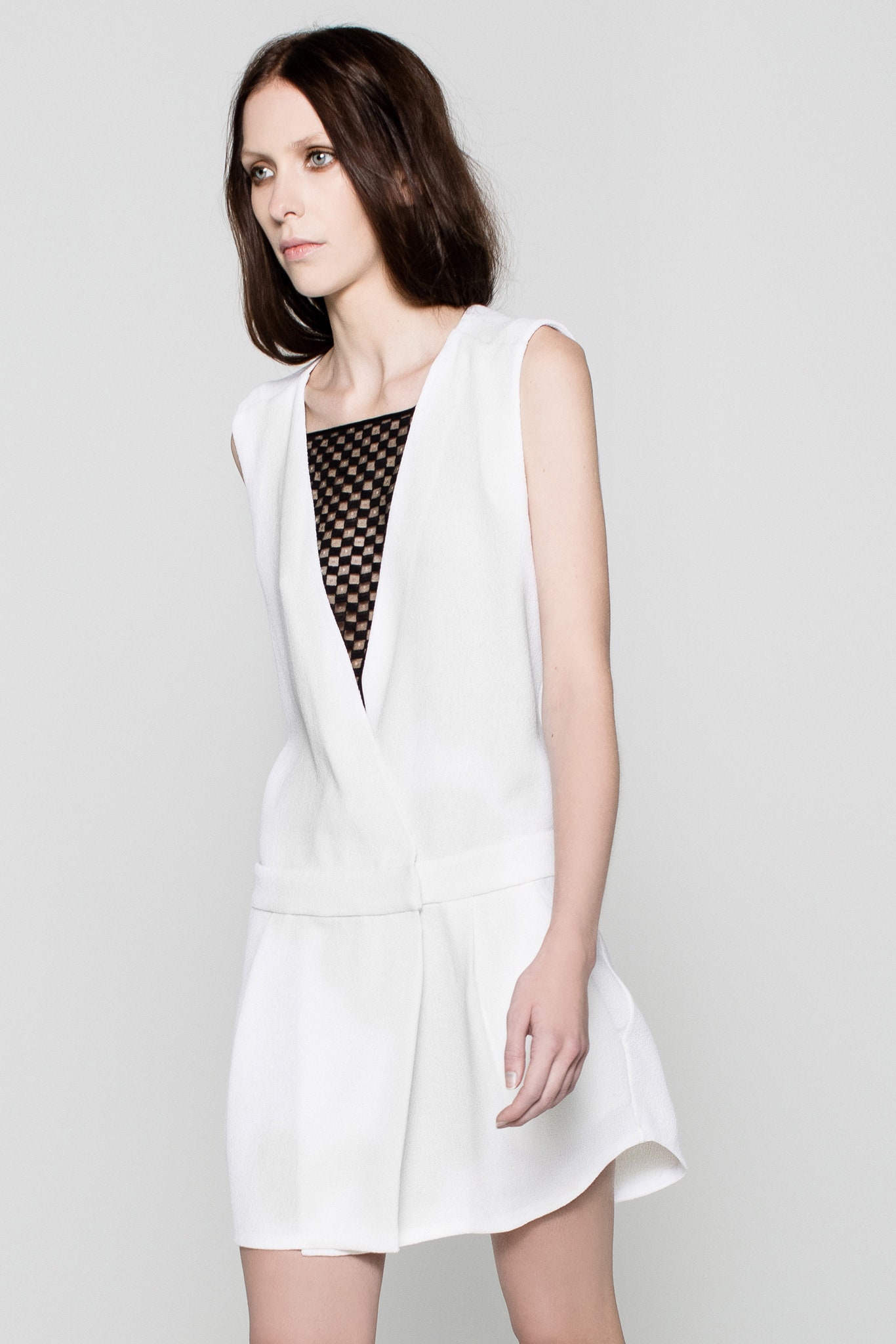 fitted white sleeveless dress