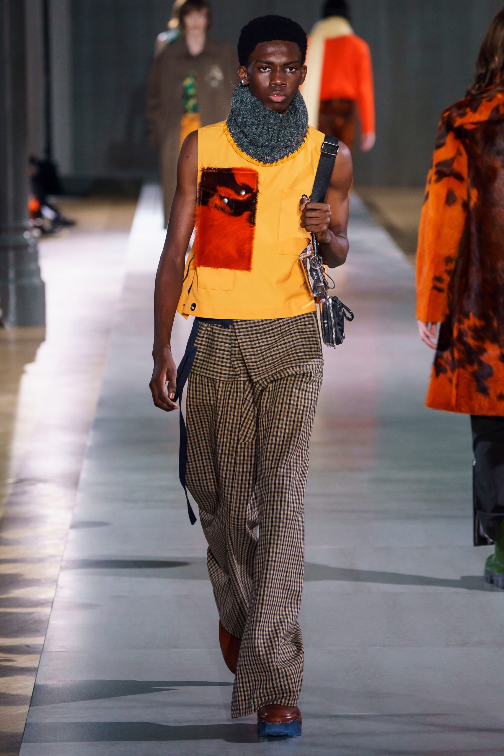 color-blocked orange top with wide-leg pants