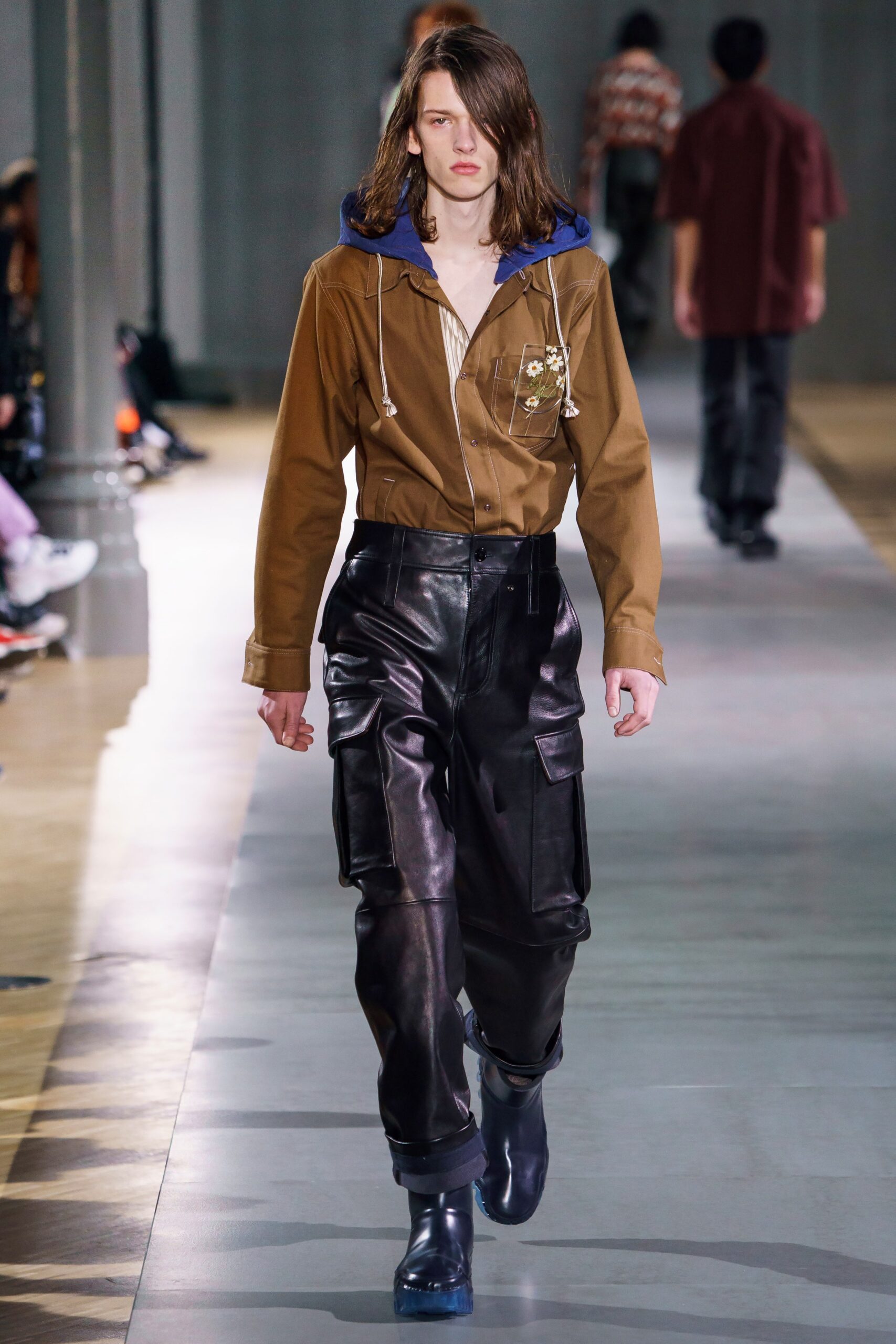 brown cotton shirt with black leather pants