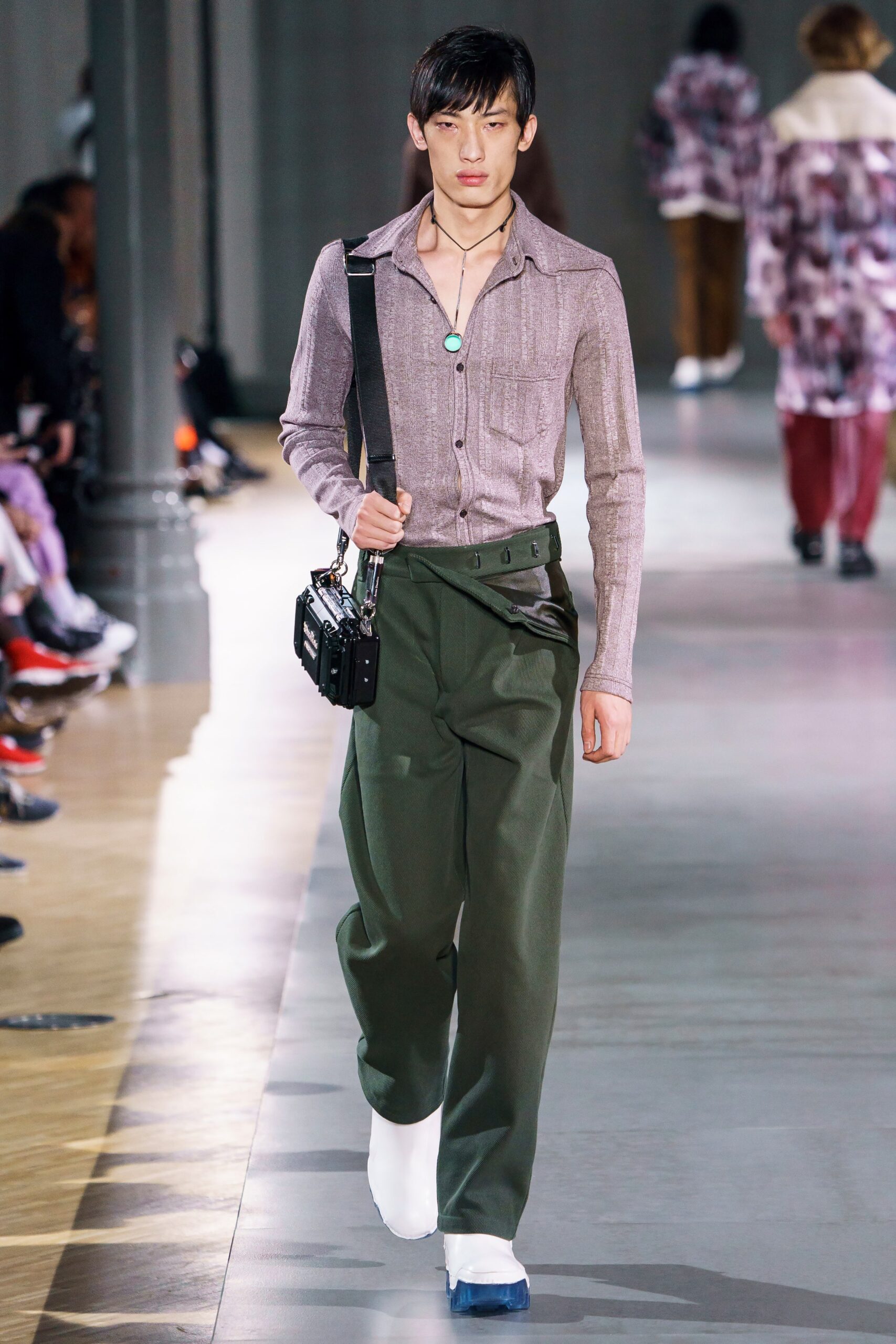 pink fitted shirt with green pants