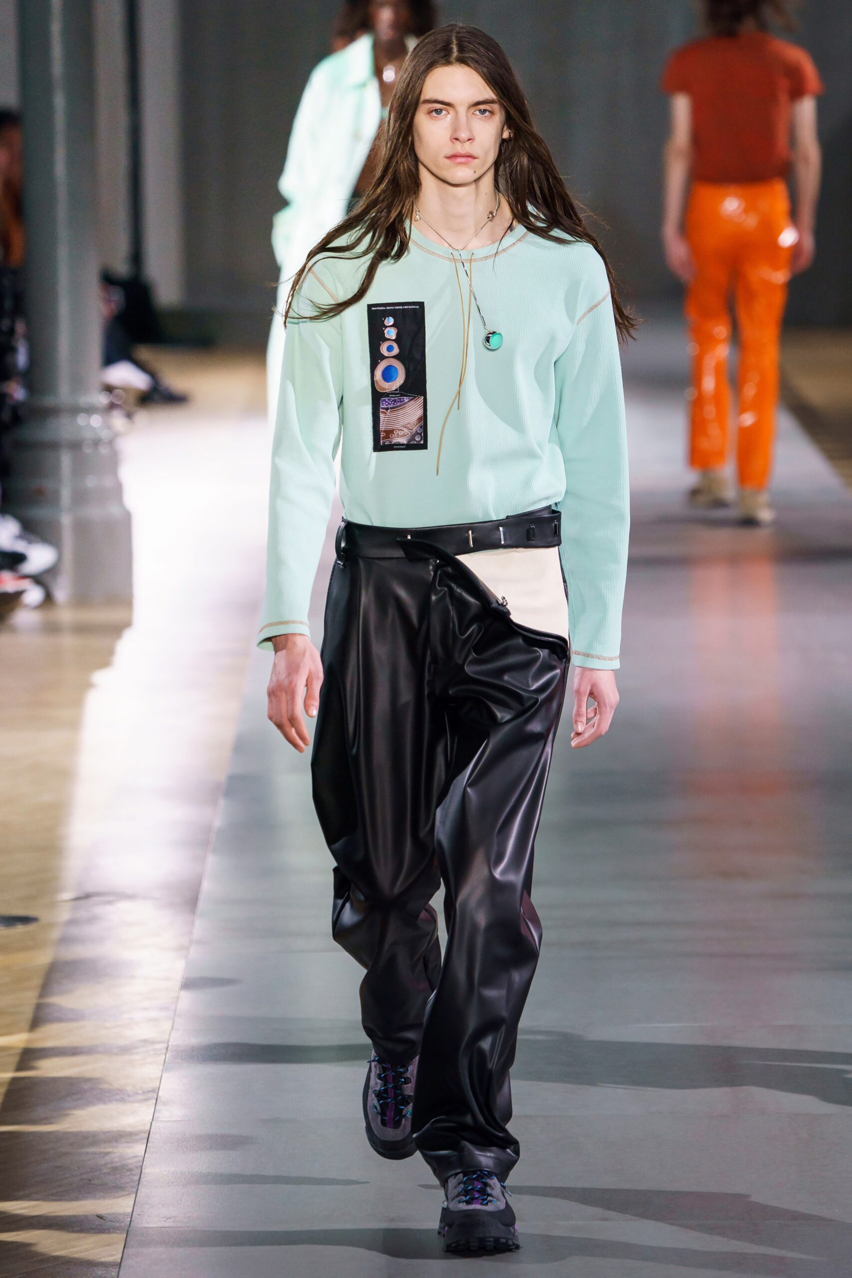 mint cotton relaxed top with black leather pants