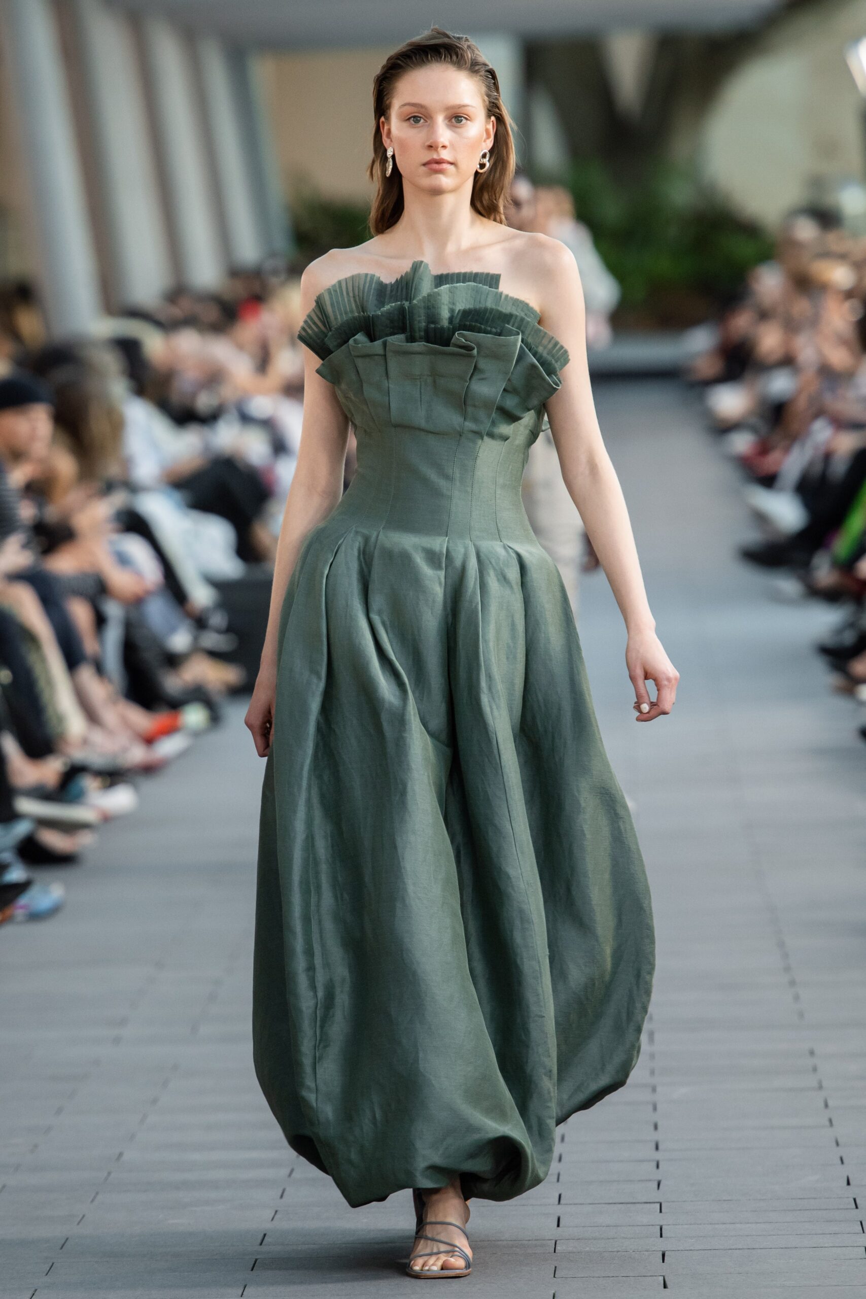 green pleated strapless gown