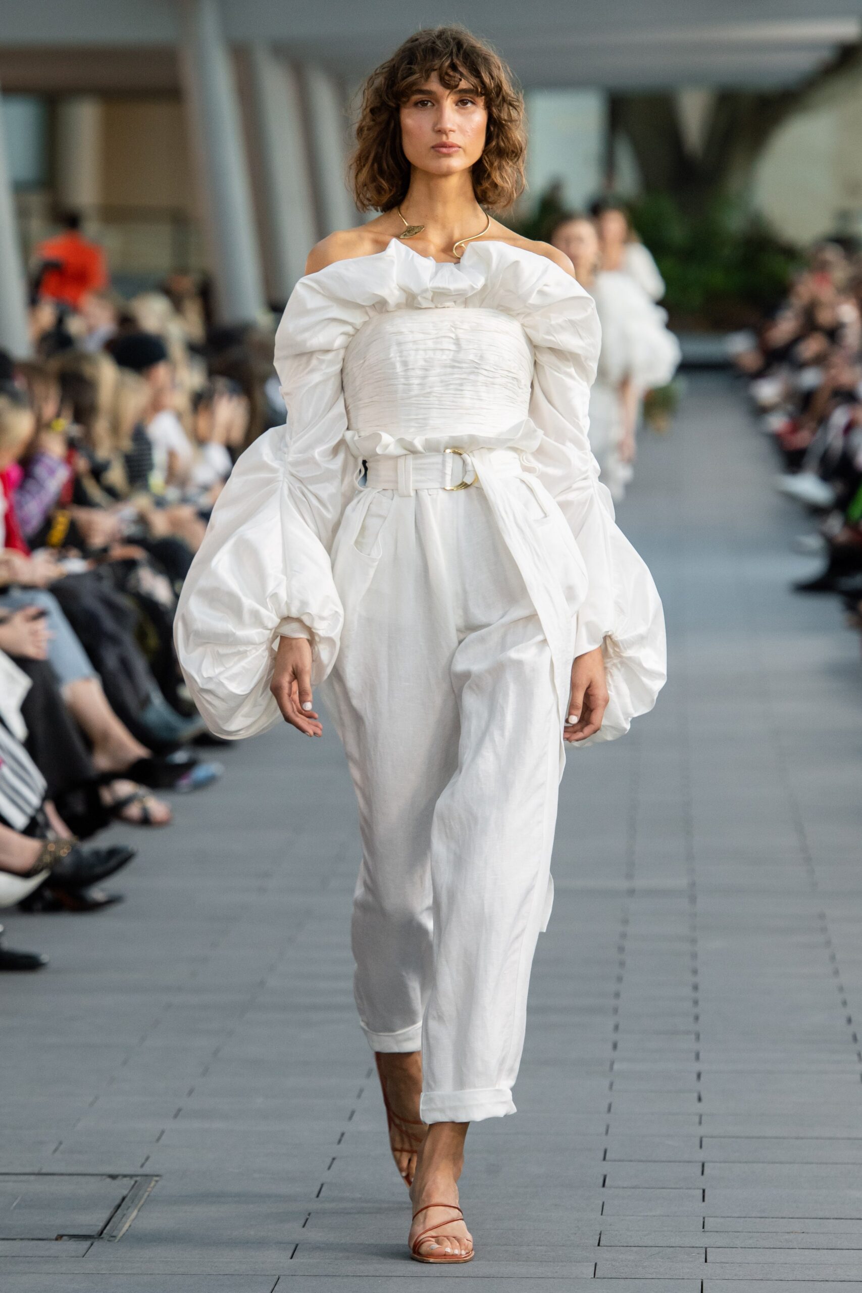 white off-shoulder blouse and relaxed pants