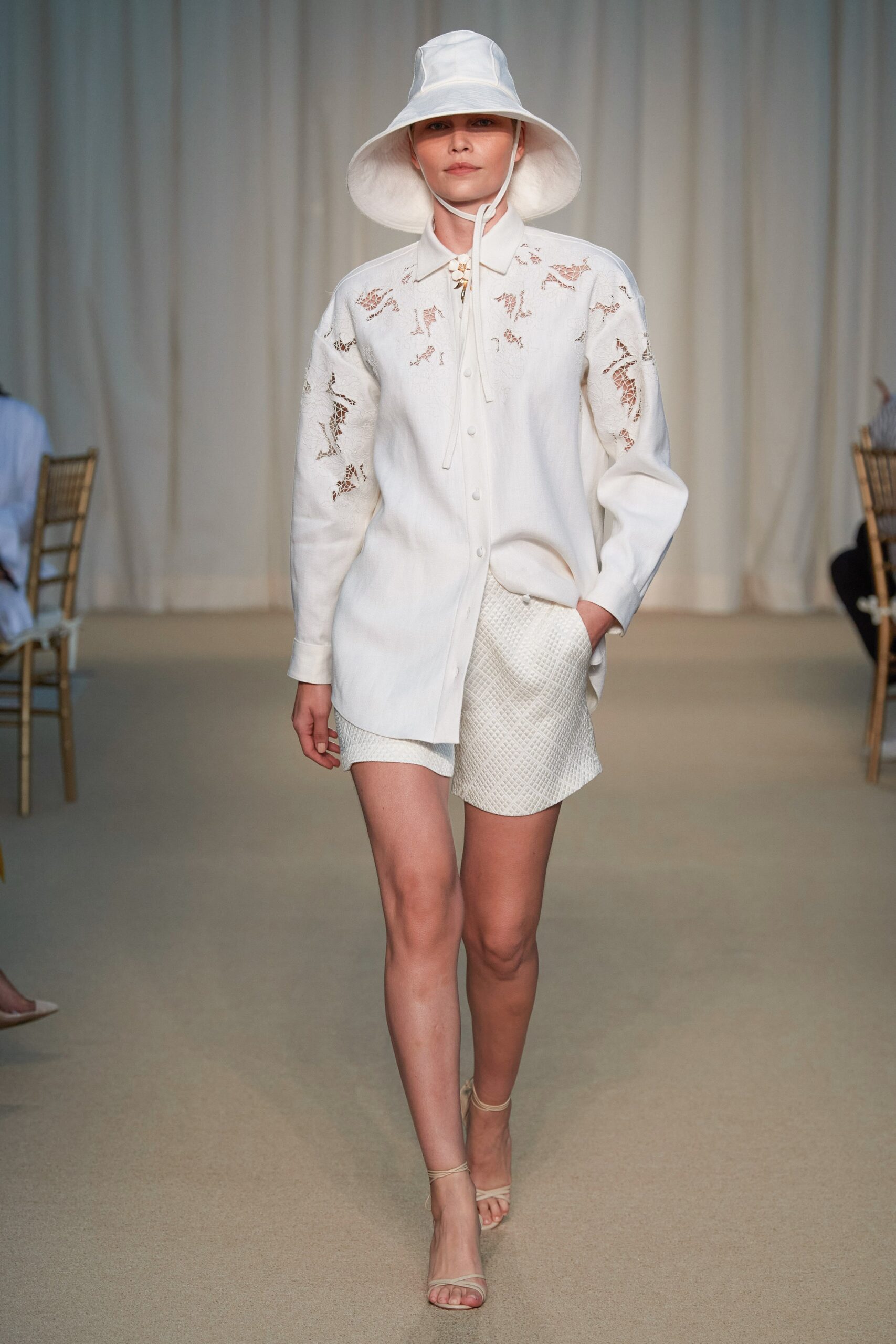 white relaxed shirt and shorts