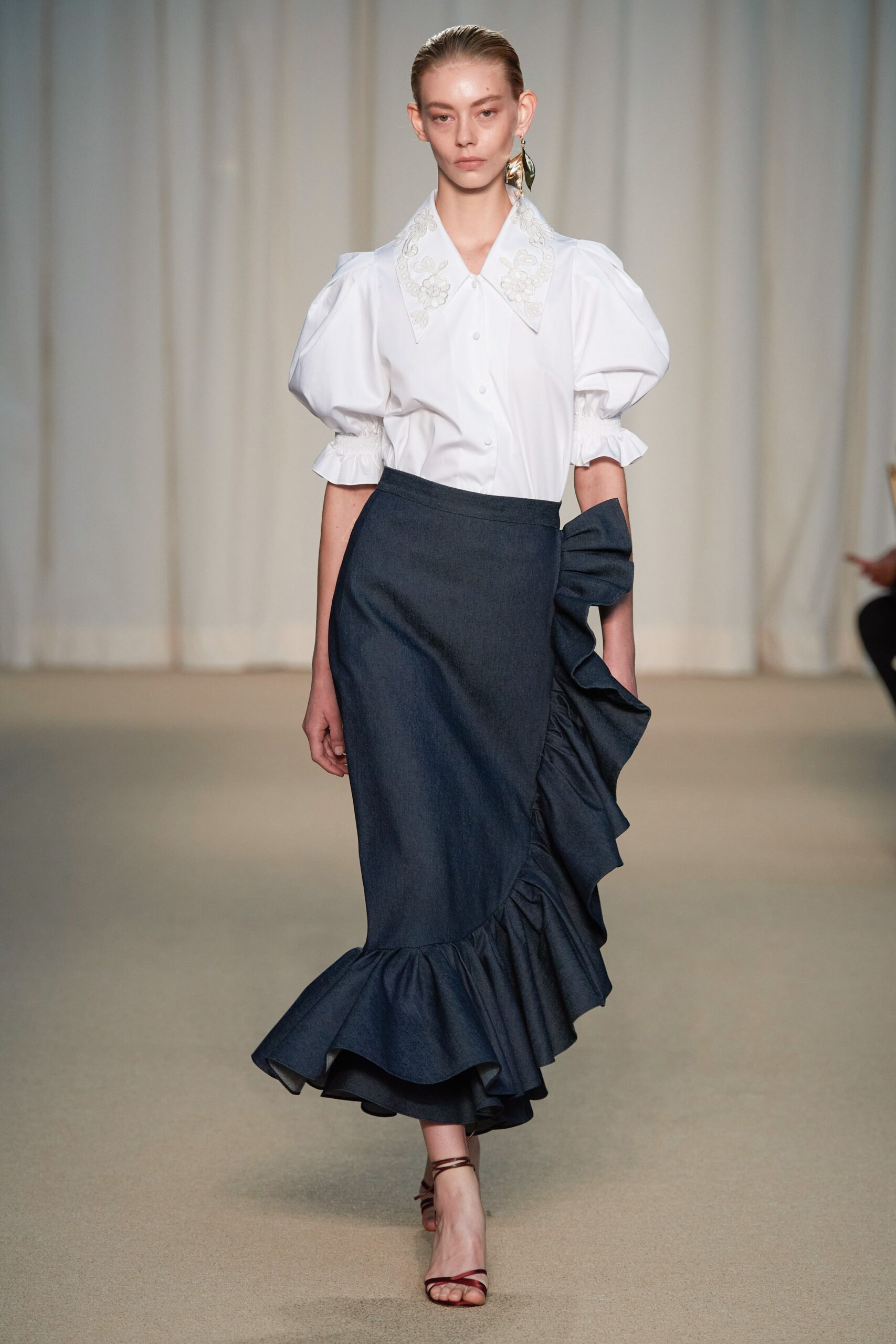 white cotton blouse and blue denim skirt
