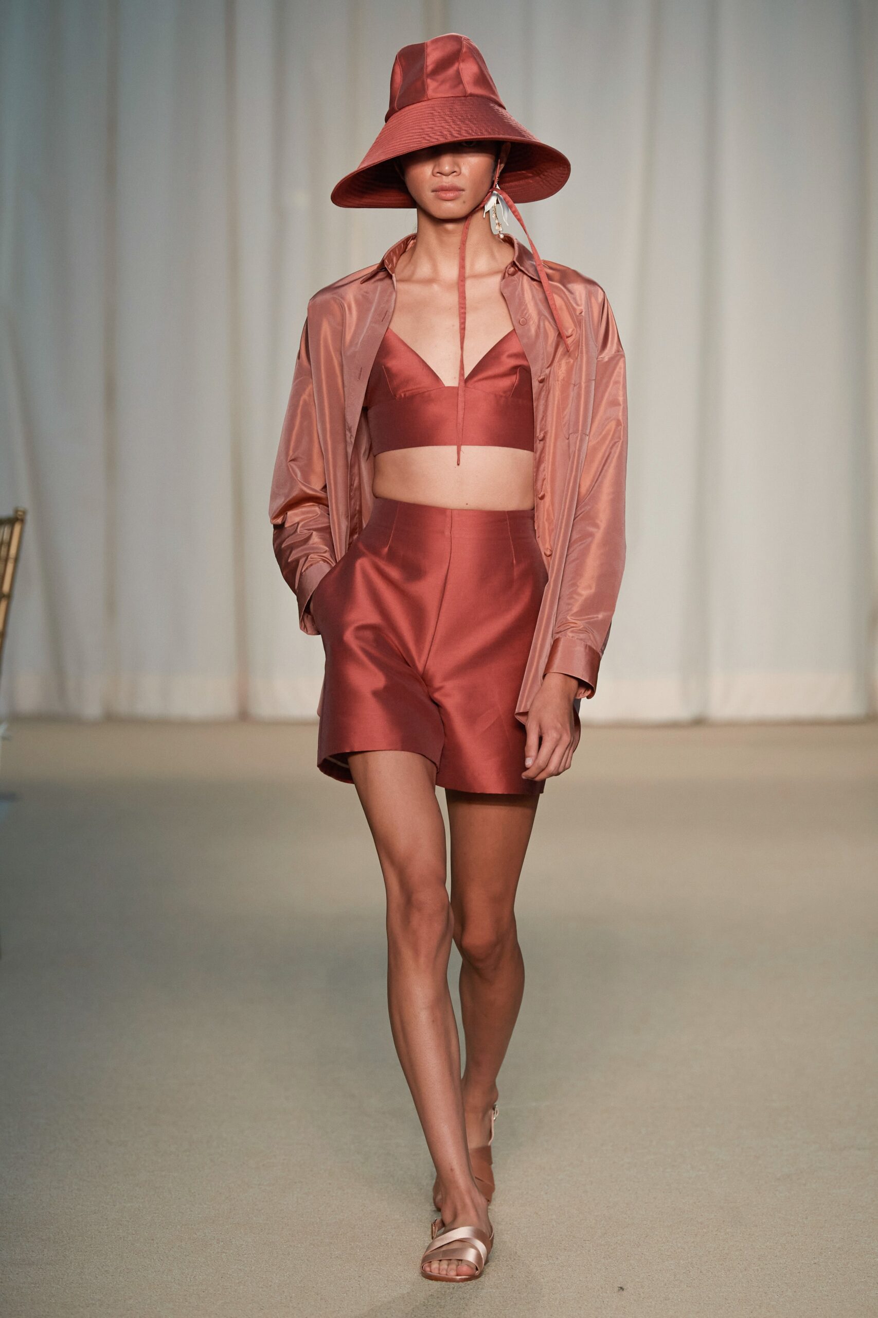 red satin jacket and crop-top