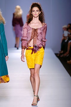 purple silk blouse and yellow skirt