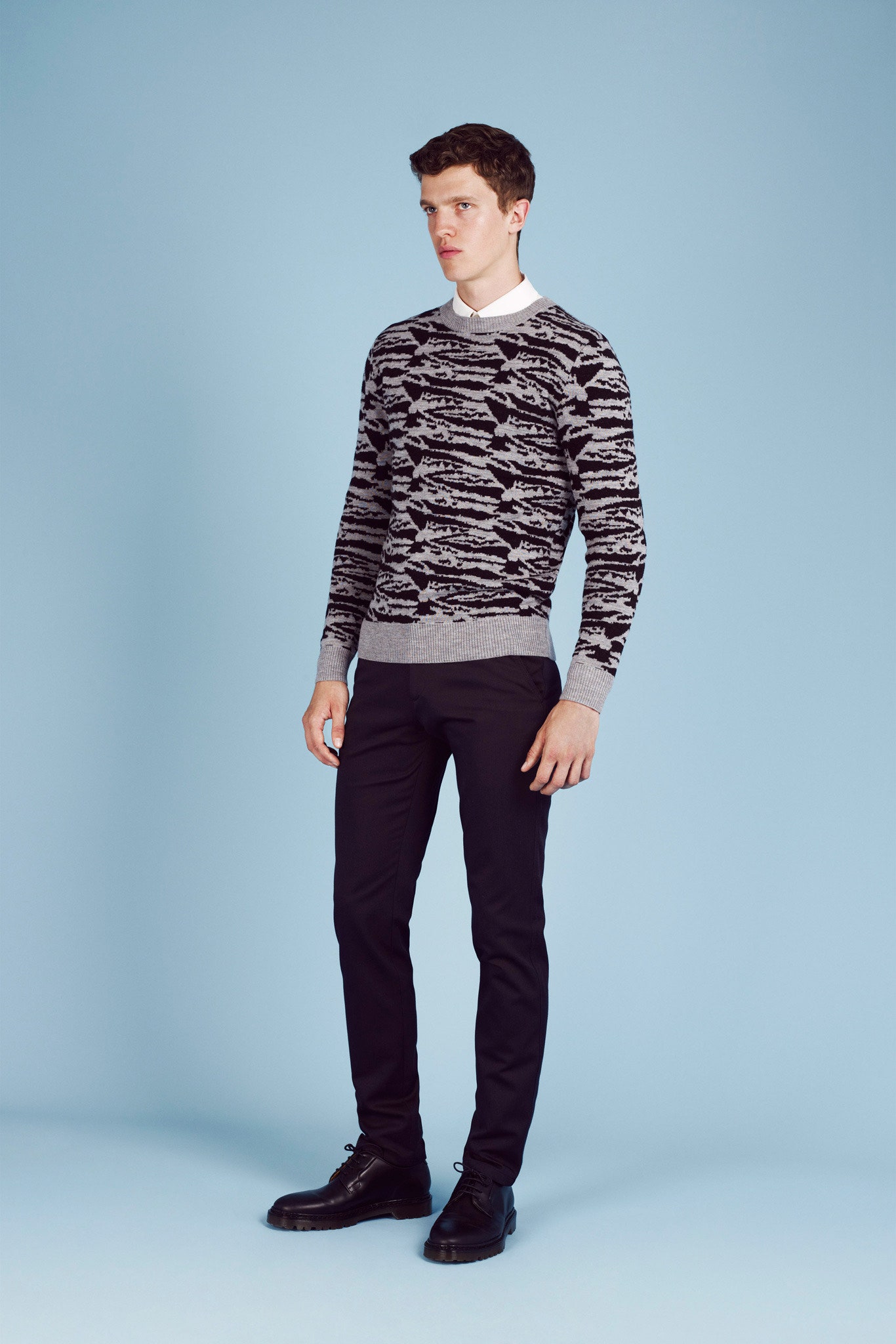 black and gray printed sweater with slim pants