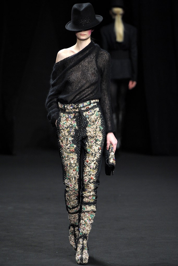 black relaxed top with embroidered pants