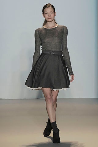 gray fitted top with black skirt