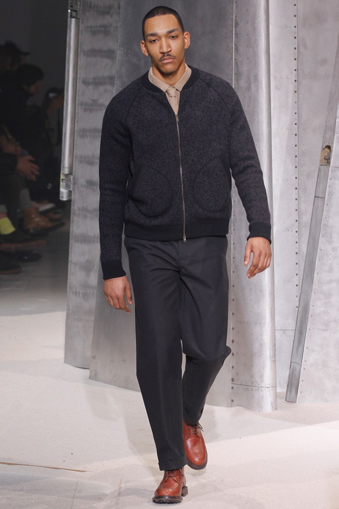 black wool jacket with relaxed pants