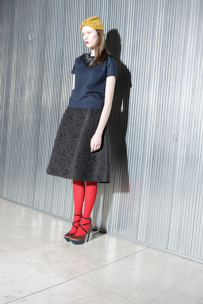black fitted a-line midi skirt