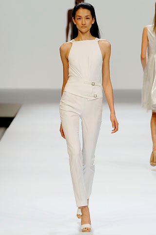 white cotton sleeveless high-neck fitted belted top