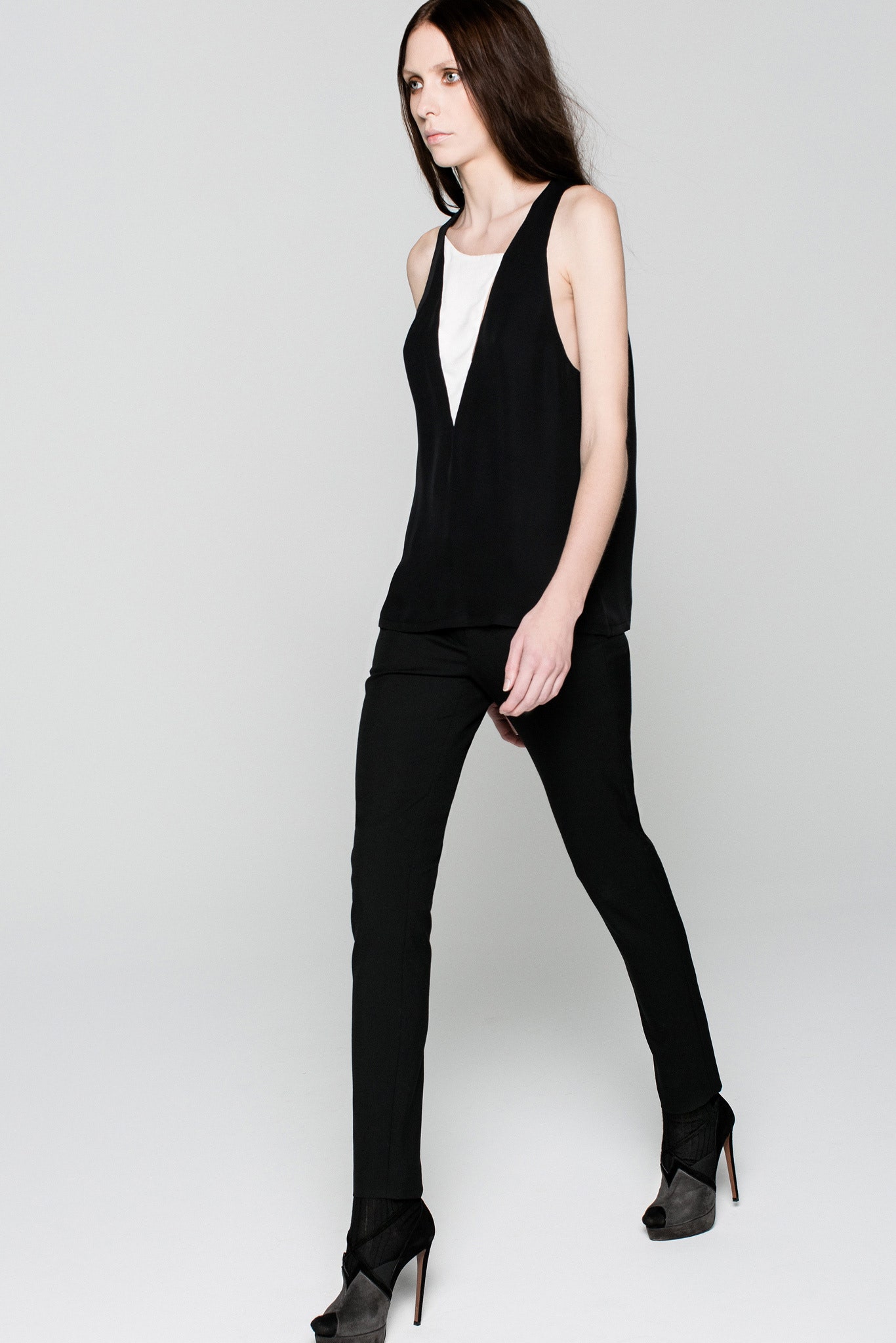 black silk sleeveless v-neck fitted top
