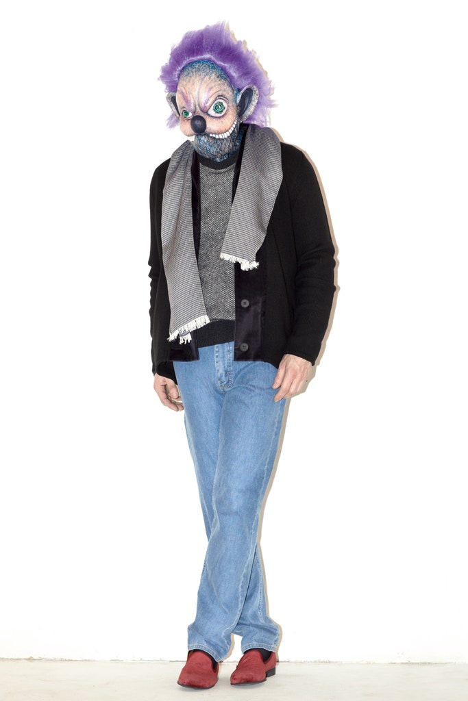 gray sweater black jacket blue jeans