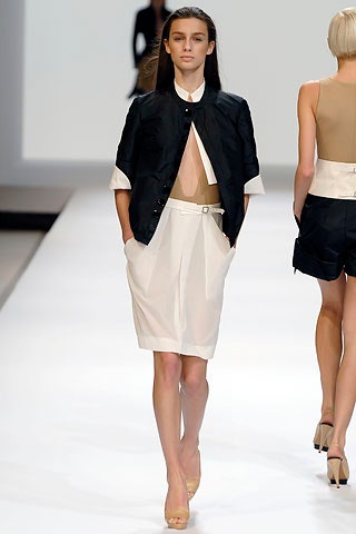 black fitted jacket and white dress