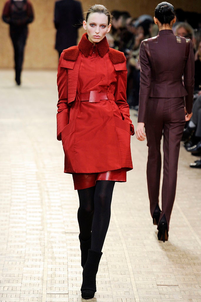red cotton long-sleeve collared fitted zippered pockets coat