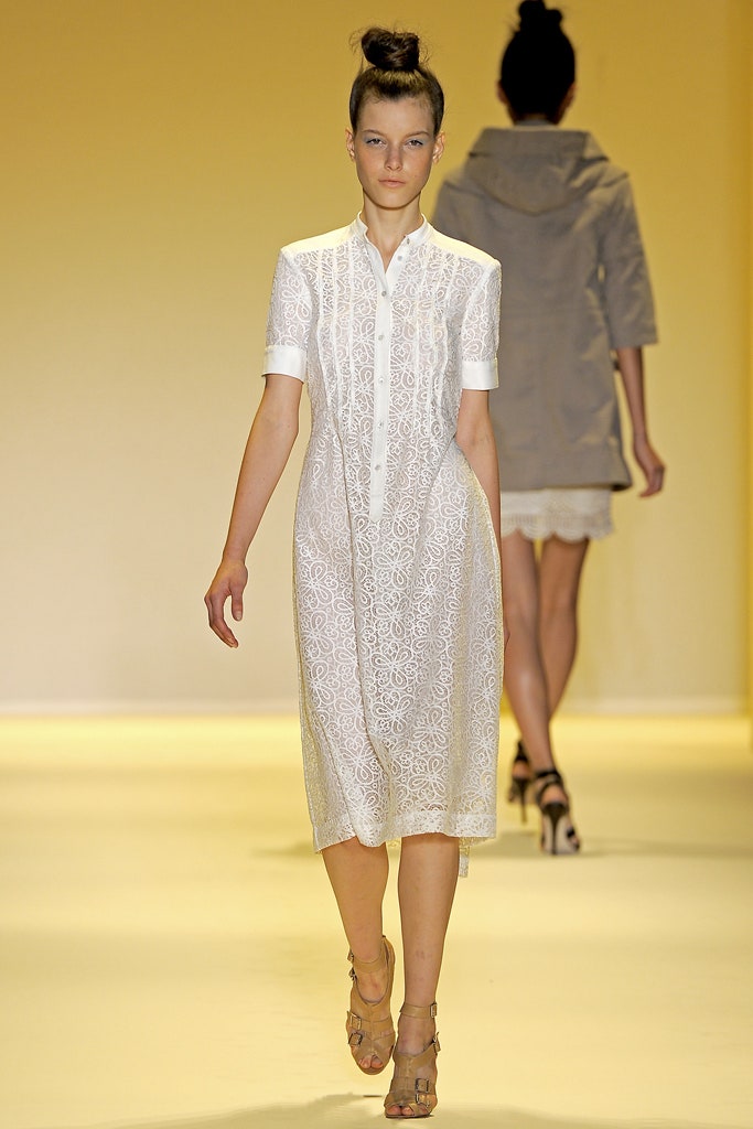 white embroidered midi dress and gray coat