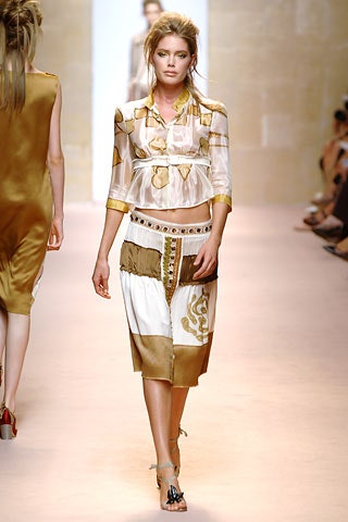white and gold silk top and skirt