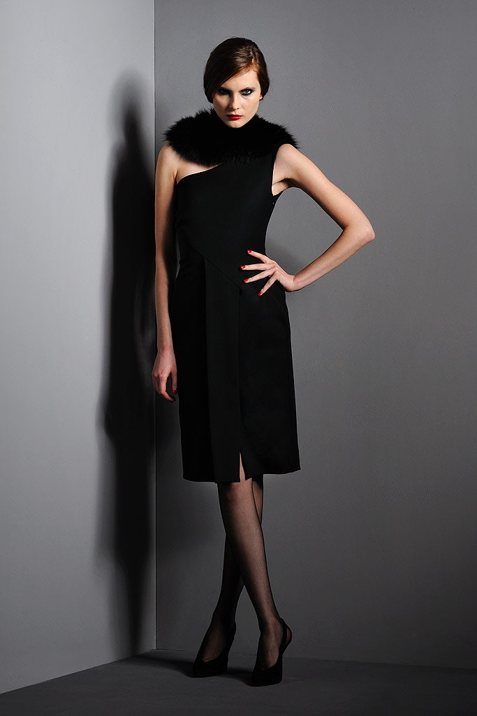 black fitted dress with fur neckpiece