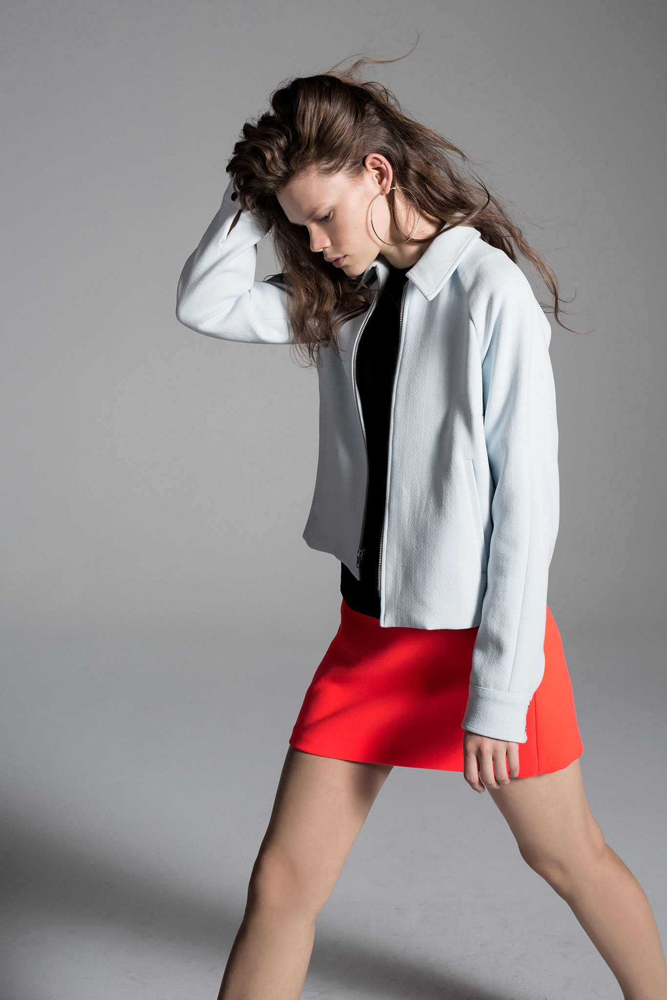 white fitted jacket with red skirt