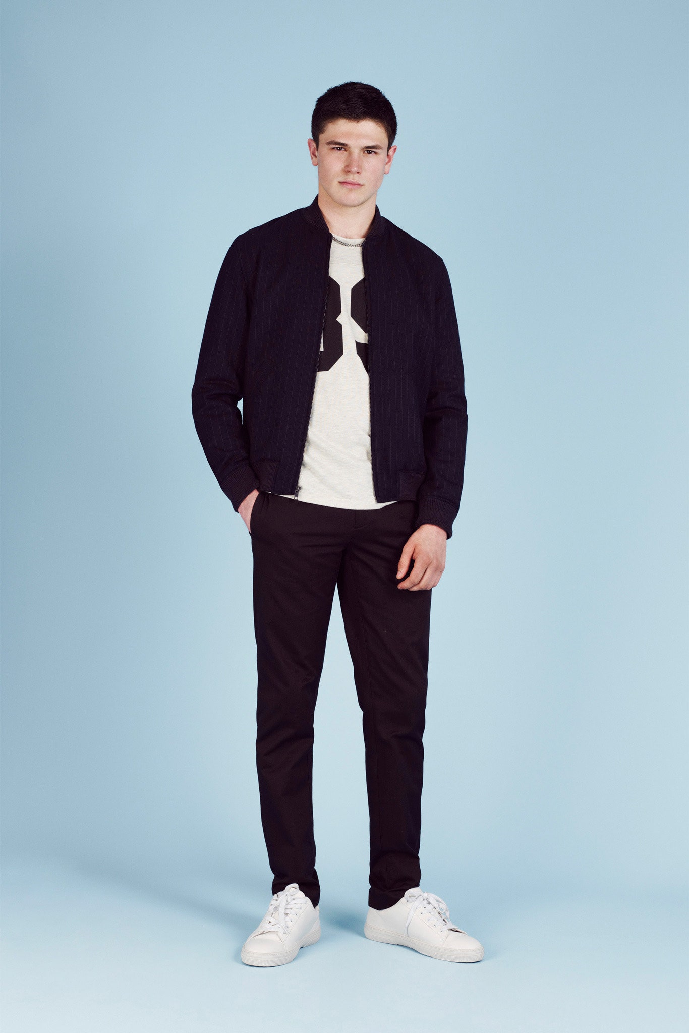 black jacket white t-shirt black pants