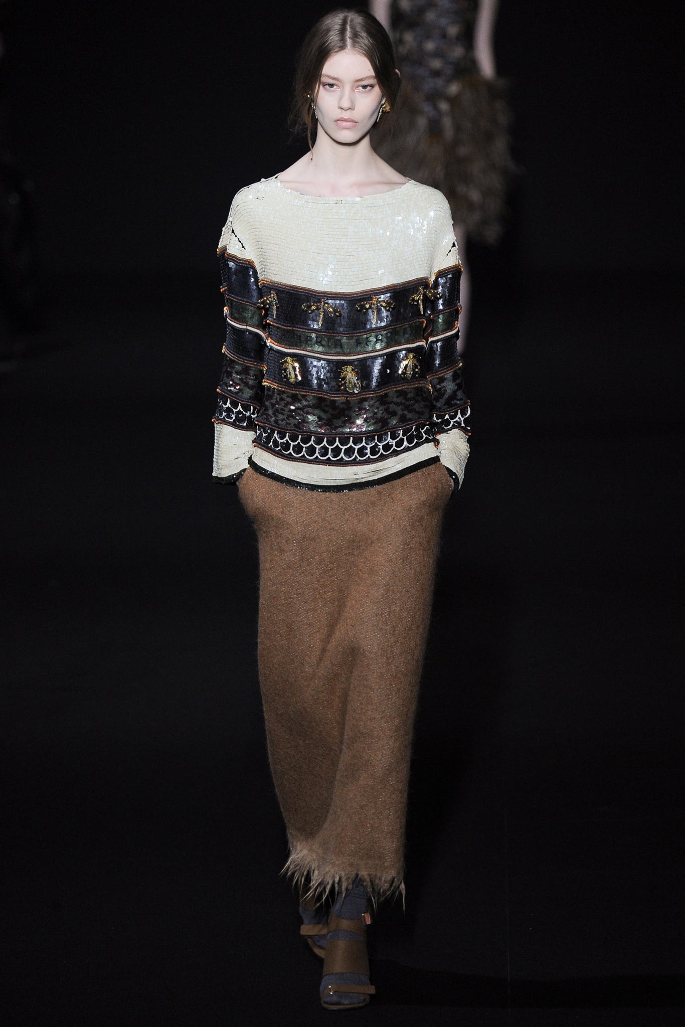 fitted black gold top with maxi skirt