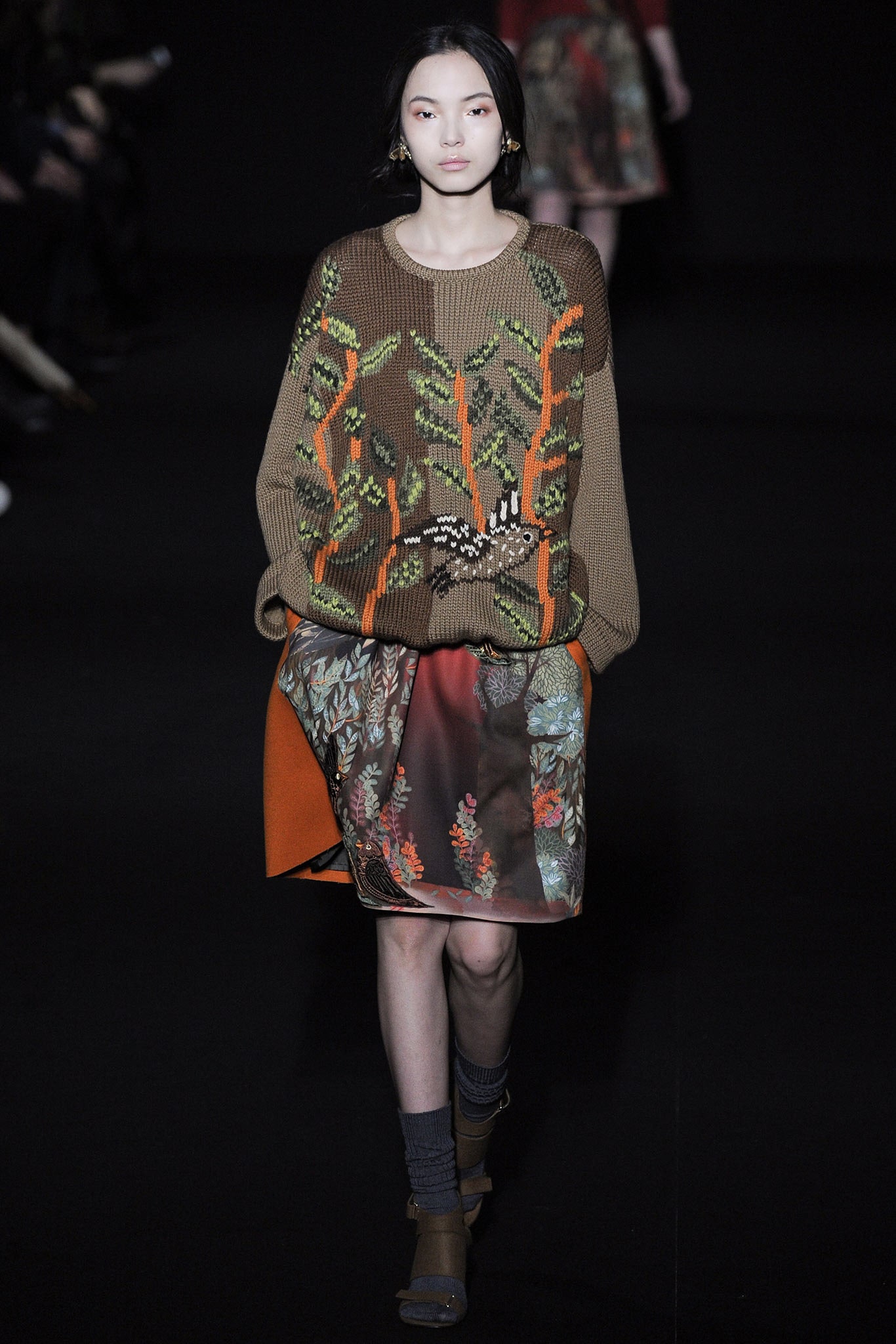 oversized brown embroidered sweater and multi skirt