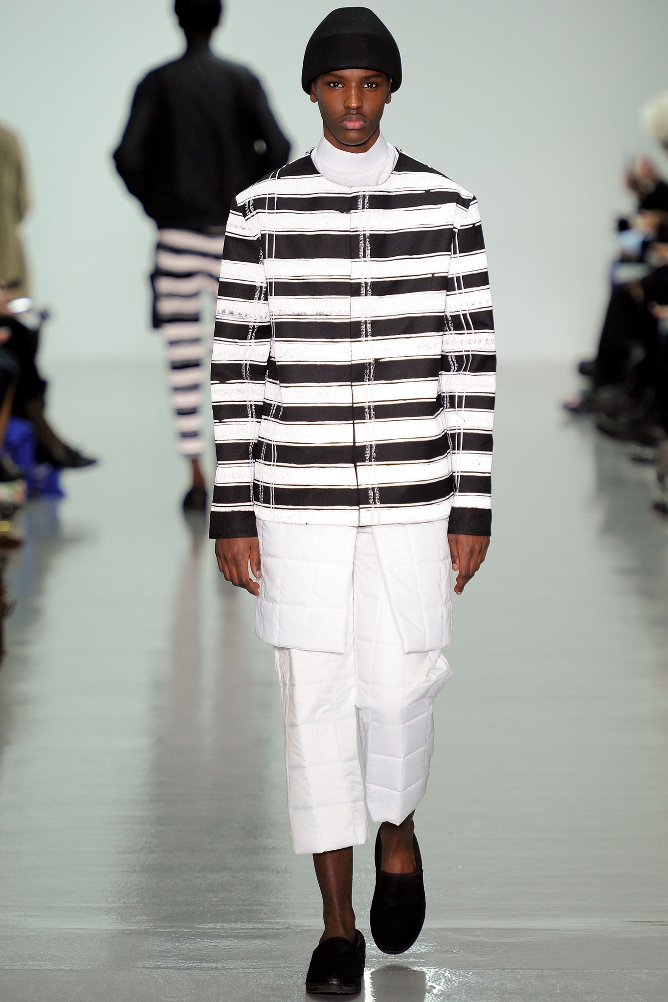 black and white striped shirt with cargo pants