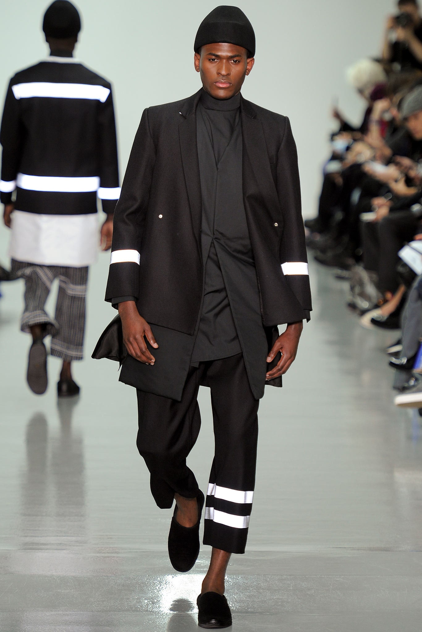 black tailored coat with fitted top