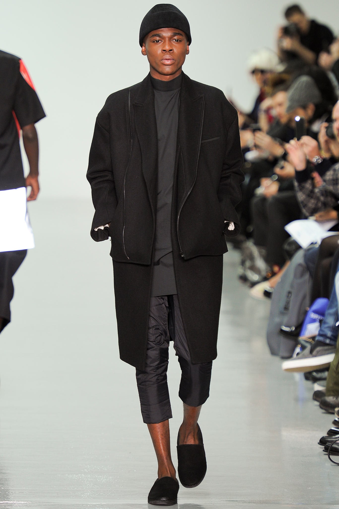 black wool coat with fitted top