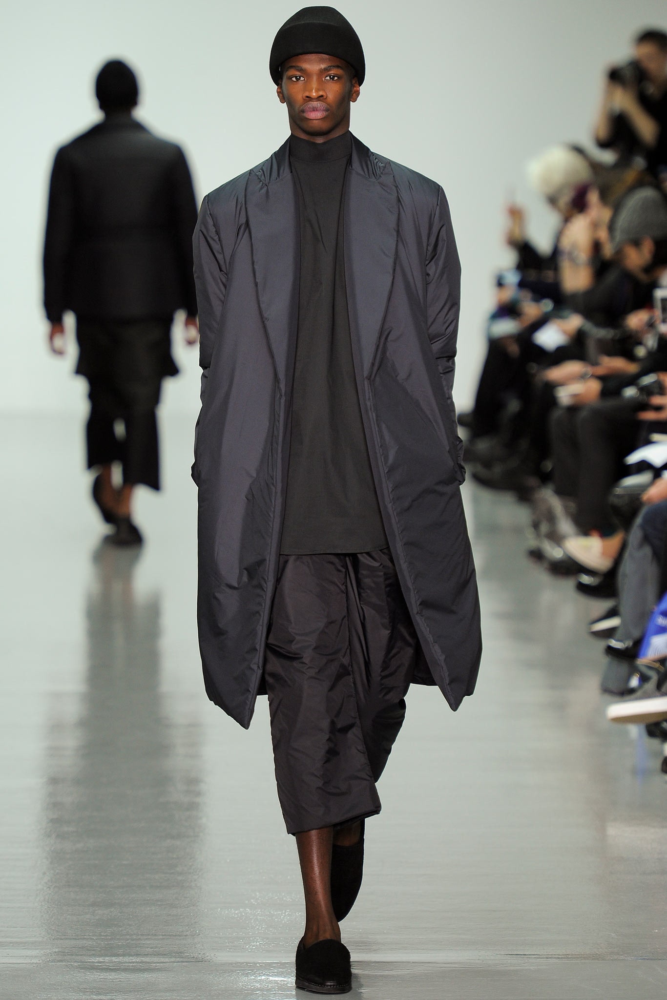 black relaxed coat with fitted top