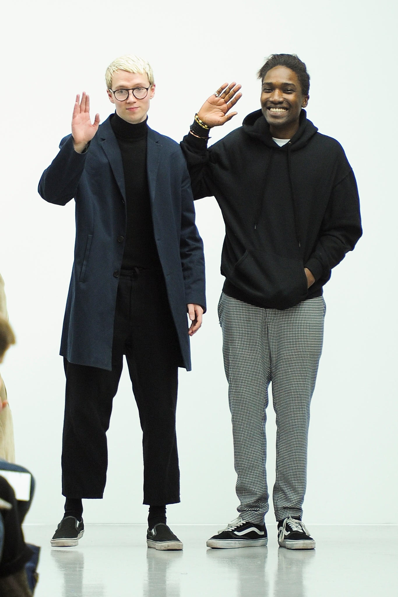 blue coat and black hoodie