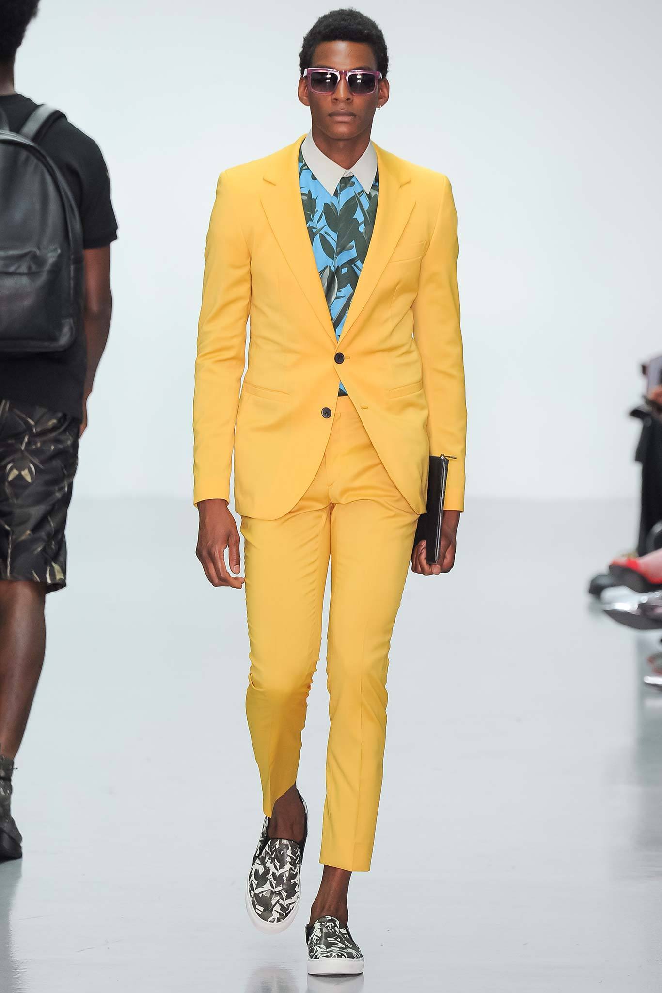 yellow tailored suit with printed shirt